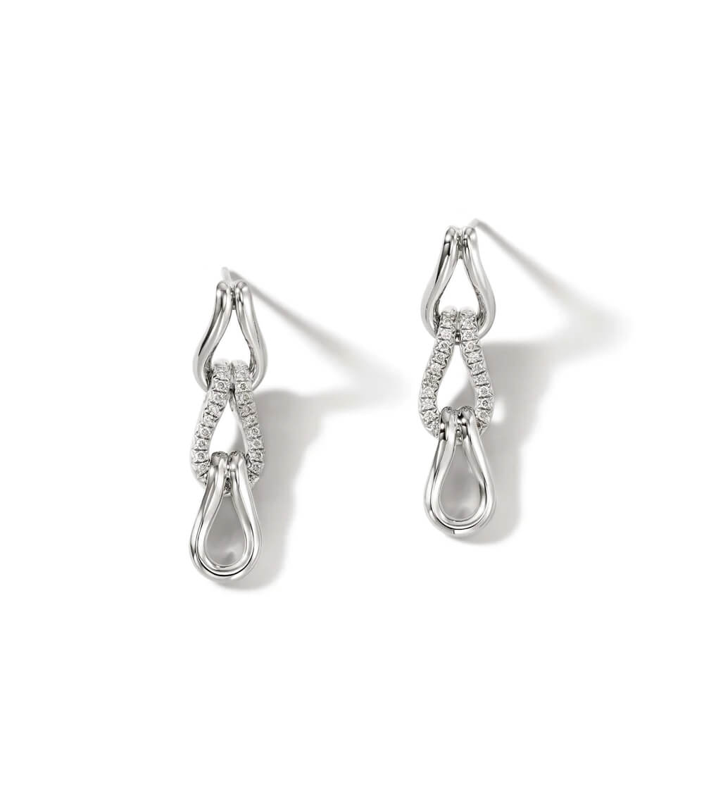 Pendientes de plata con diseño moderno, adornados con piedras brillantes, perfectos para ocasiones especiales y uso diario.